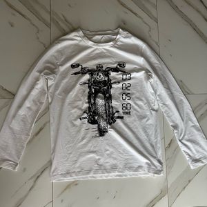 White long sleeve T shirt. I really like the use of fabric.